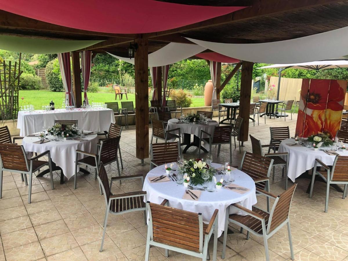 Au Feu De Bois Hotel Amou Esterno foto