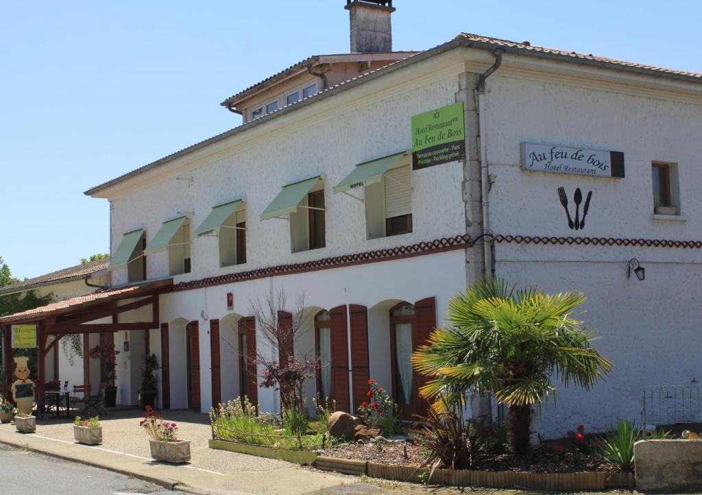 Au Feu De Bois Hotel Amou Esterno foto