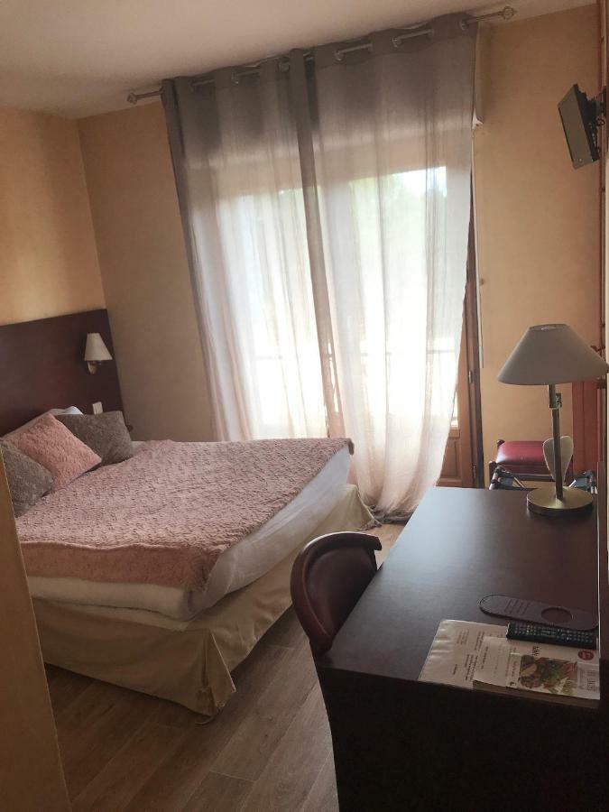 Hotel Au Feu De Bois Amou Esterno foto