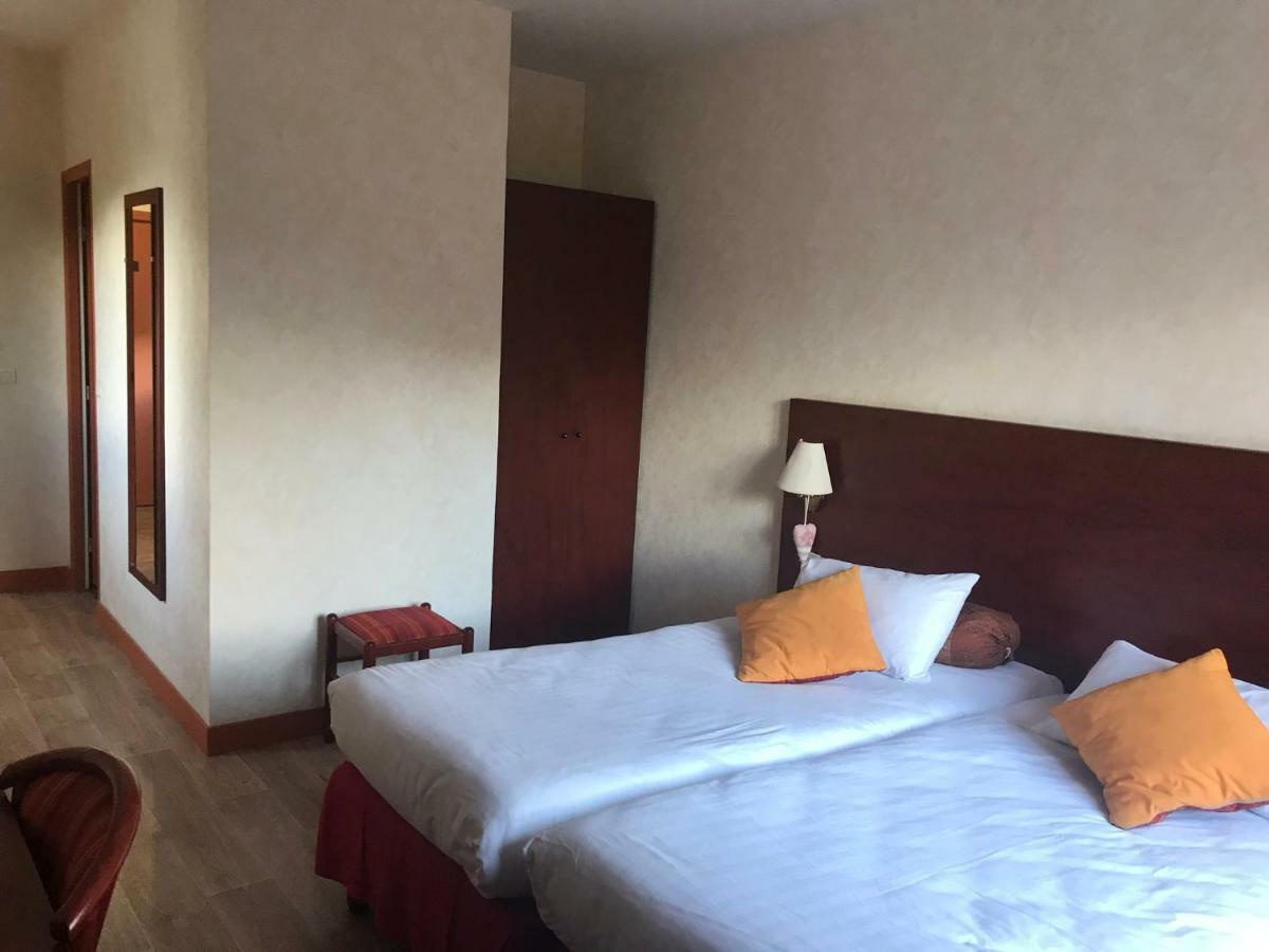 Hotel Au Feu De Bois Amou Esterno foto